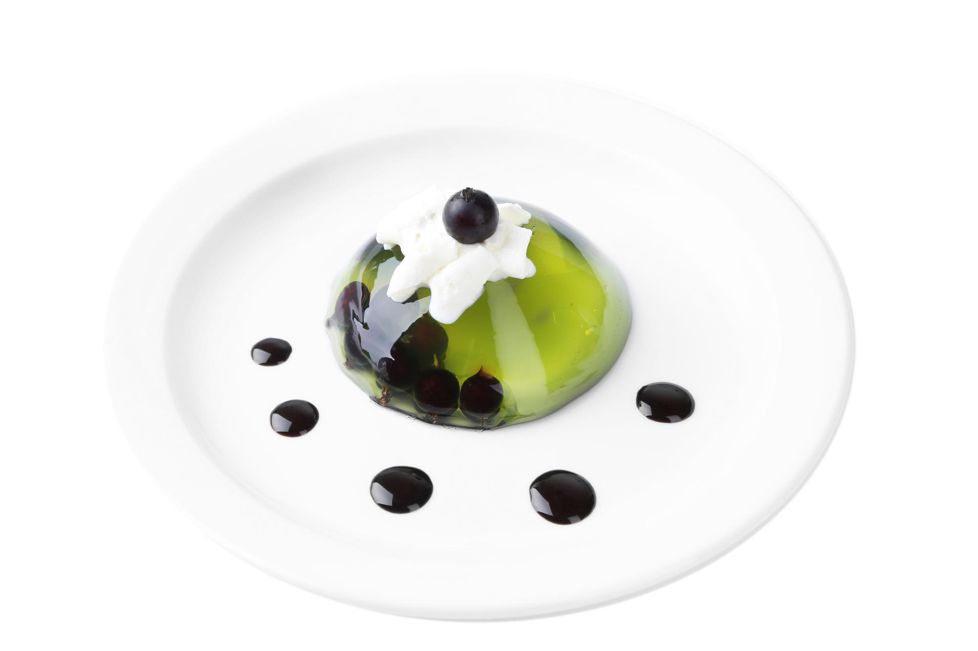 Modern plated dessert with geometric garnish